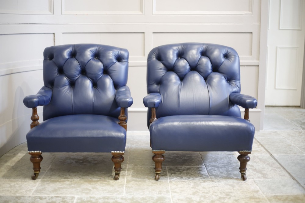 Pair of Victorian his and hers Leather open armed armchairs View X