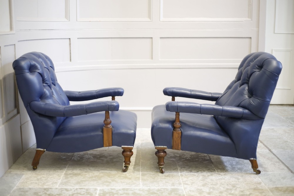 Pair of Victorian his and hers Leather open armed armchairs View XI