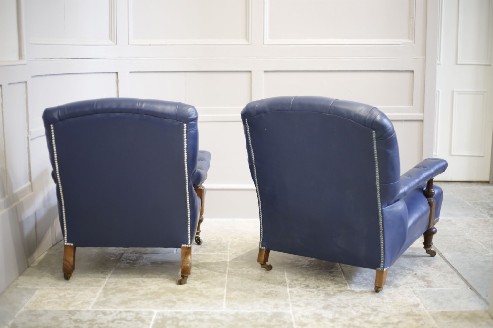 Pair of Victorian his and hers Leather open armed armchairs View XII