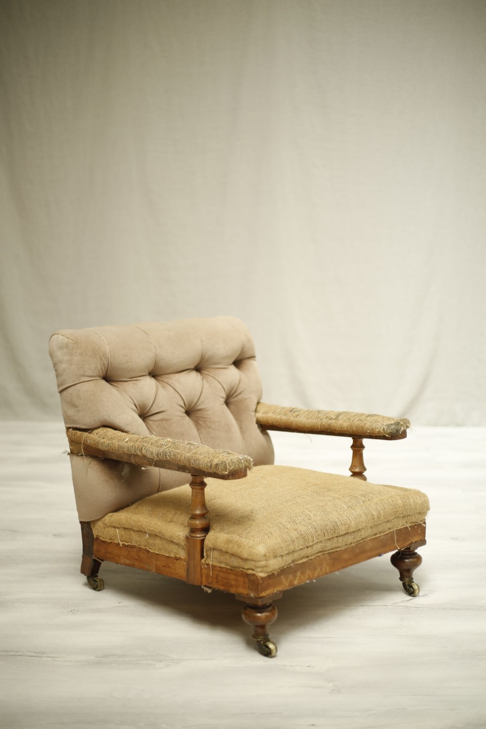 Victorian Buttoned back open armchair