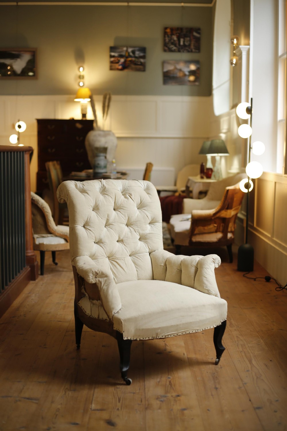 Napoleon III scroll backed buttoned armchair