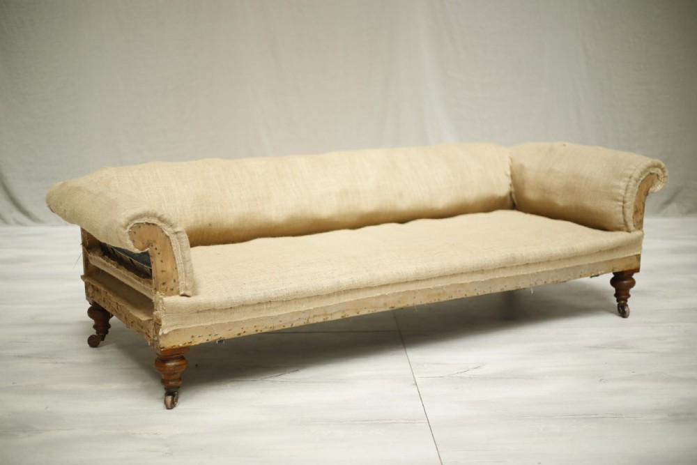 Victorian low backed English country house sofa View II