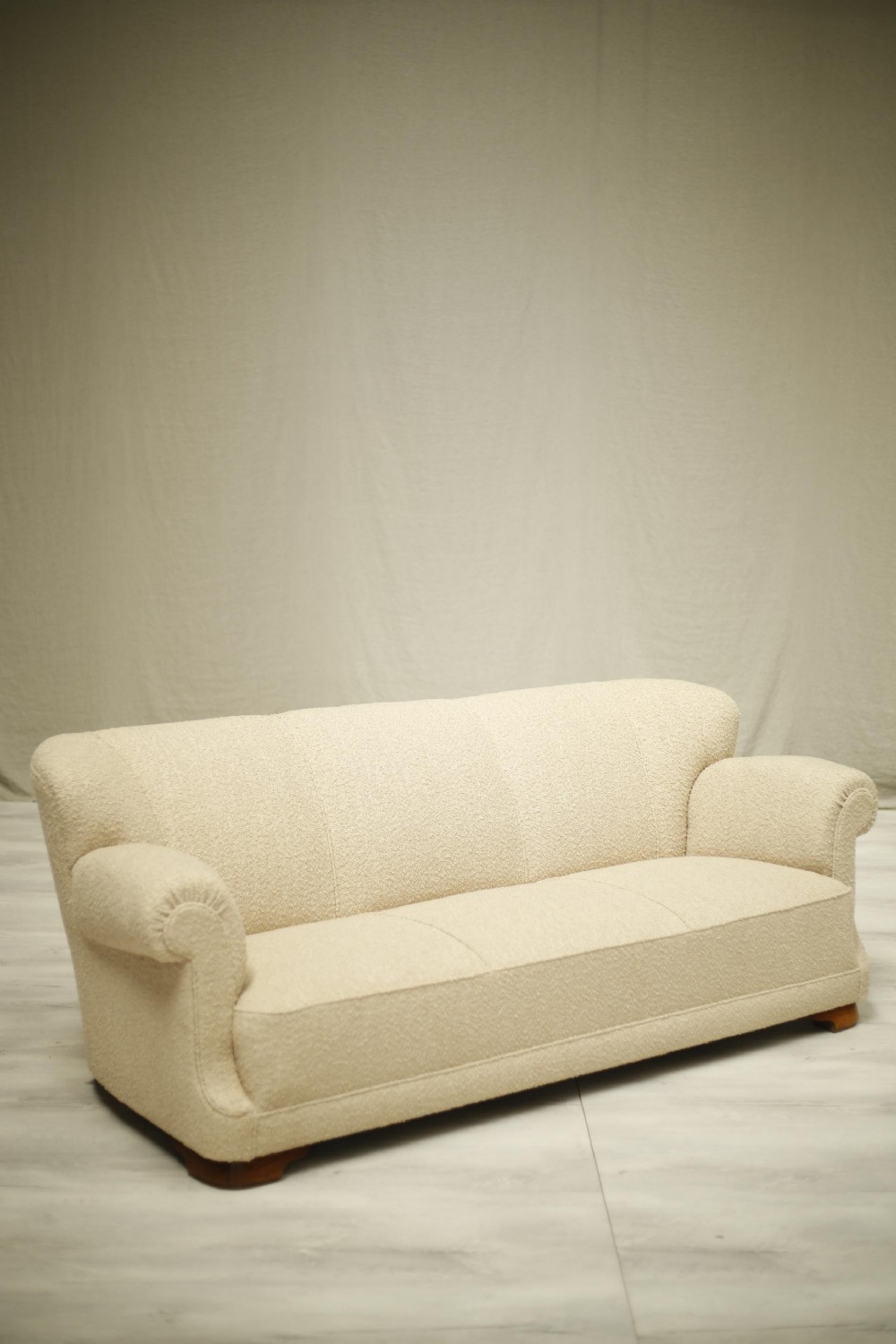 Large 1930's sofa upholstered in Boucle 