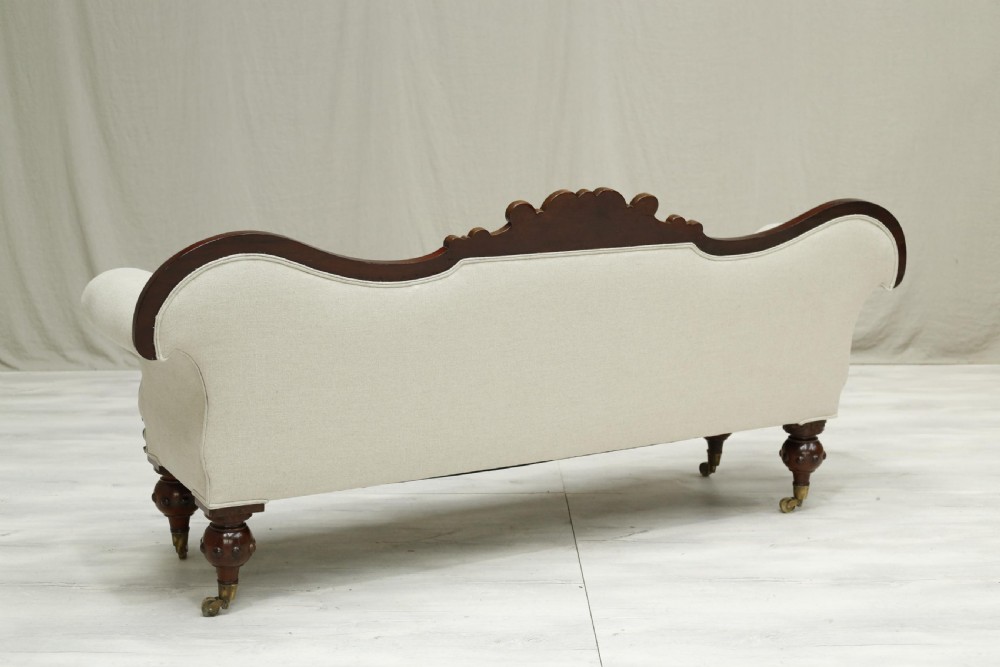 English Regency mahogany sofa upholstered in linen View III