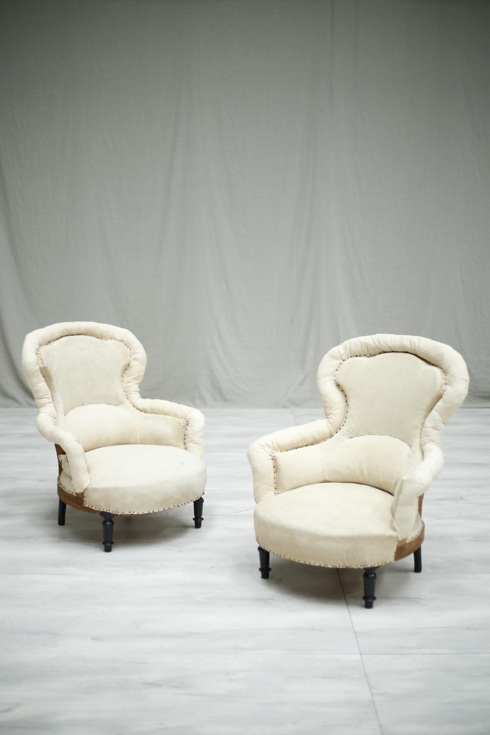 Pair of Napoleon III French pie crust armchairs