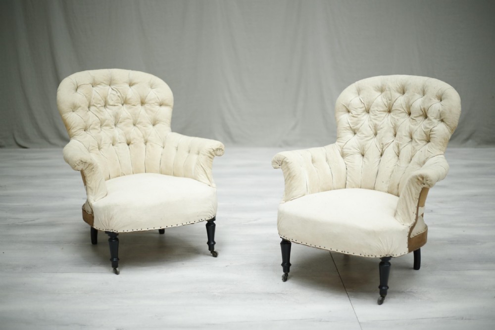 Pair of Napoleon III French buttoned spoon back armchairs View III