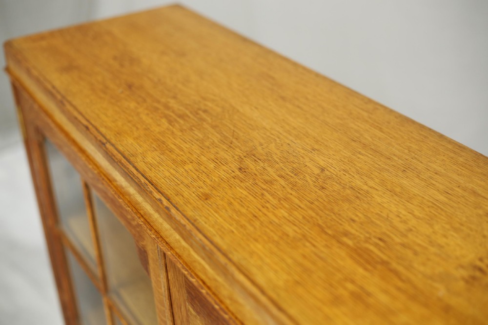 Single c.1920 oak glazed library cabinet View X