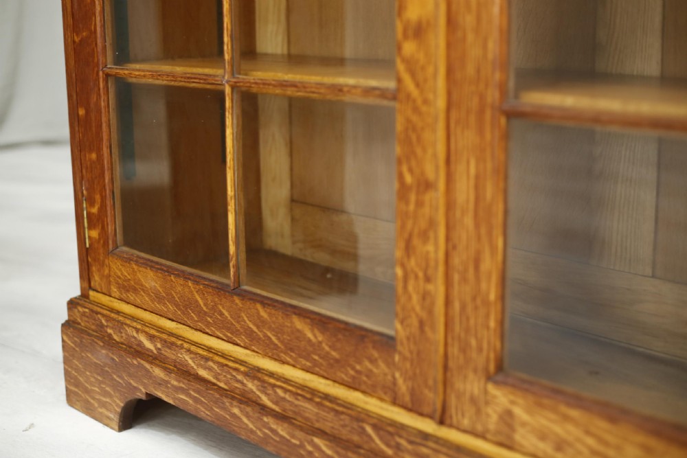 Single c.1920 oak glazed library cabinet View XII
