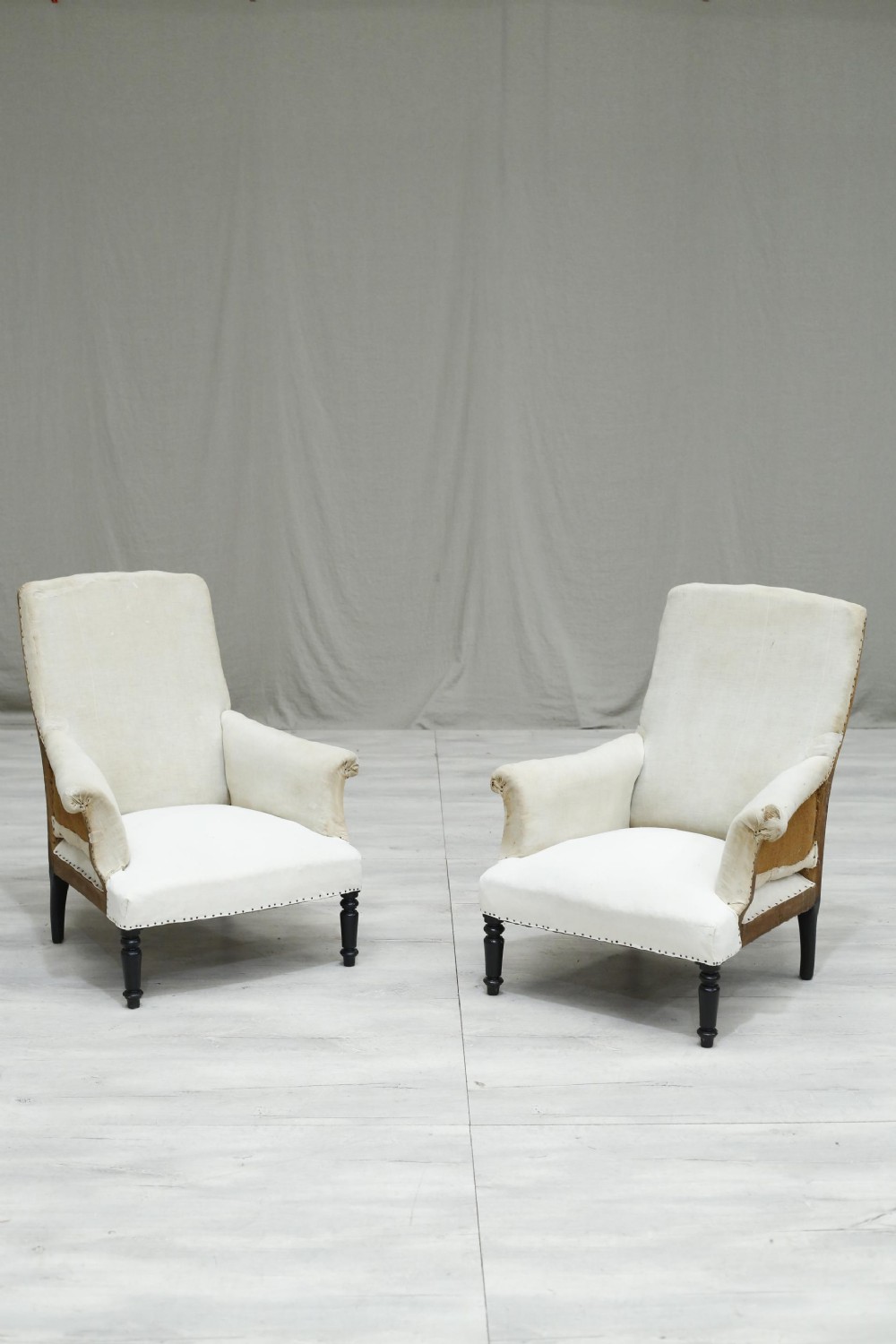 Pair of Napoleon III square backed armchairs