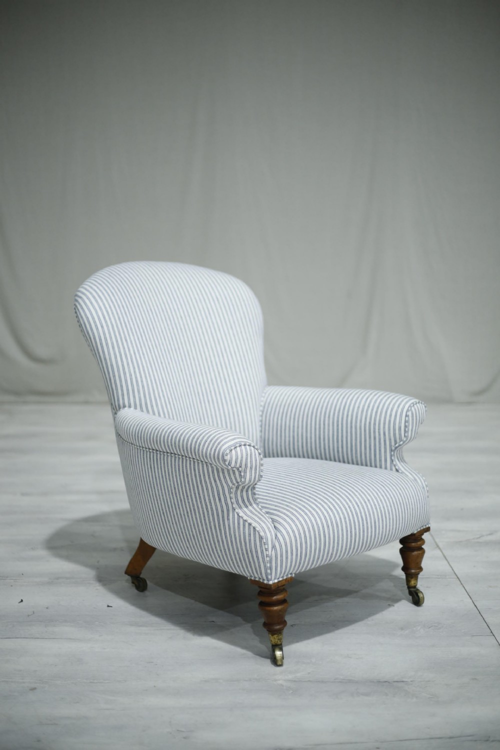 Country house armchair upholstered in ticking fabric