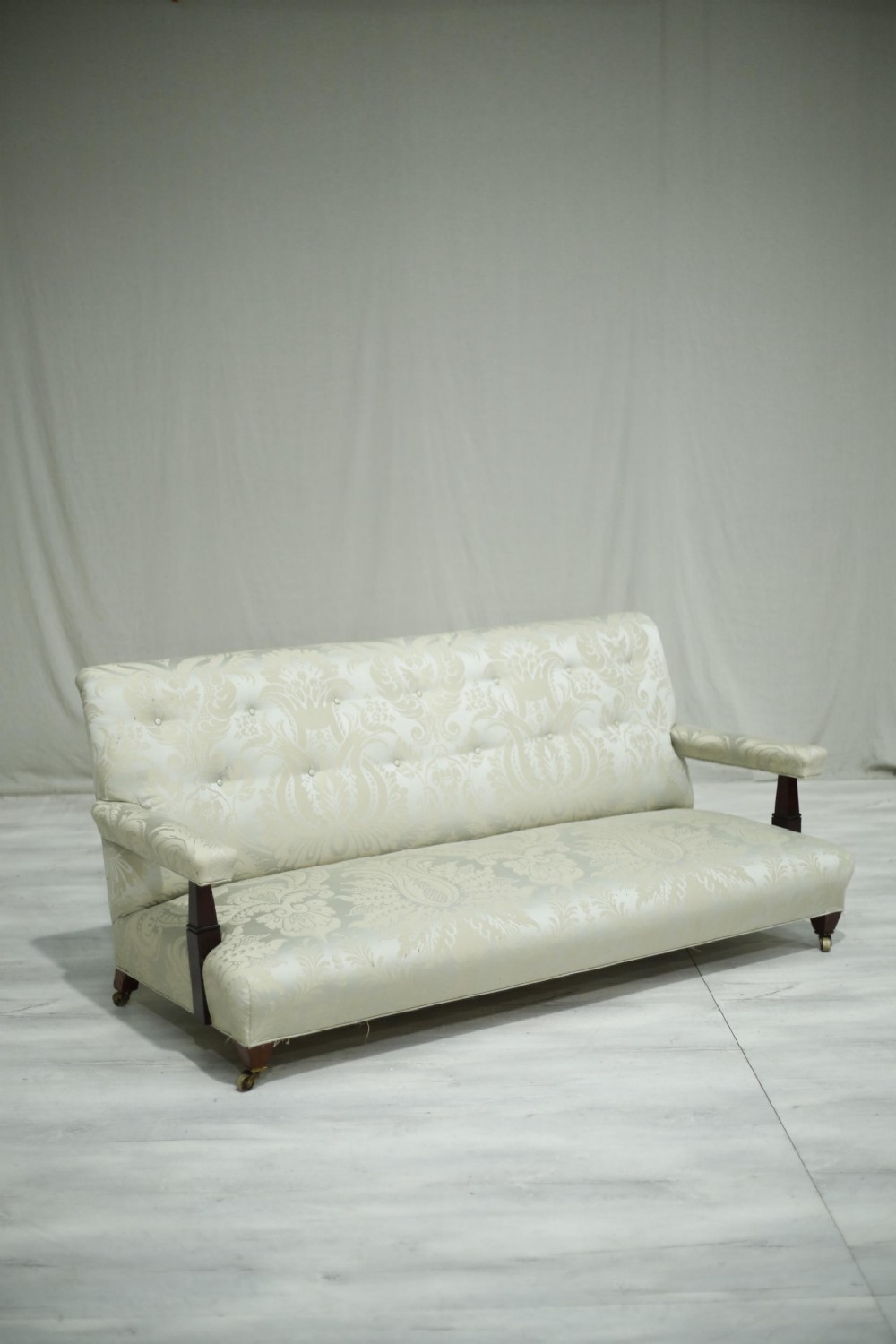 c.1900 Howard and sons style open armed sofa