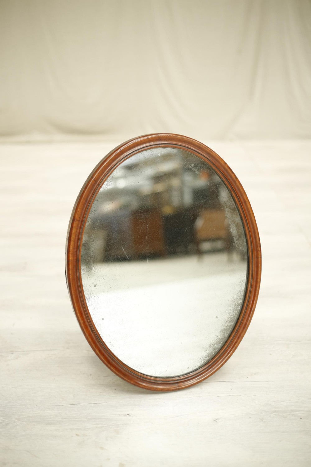 19th century Oval mahogany wall mirror