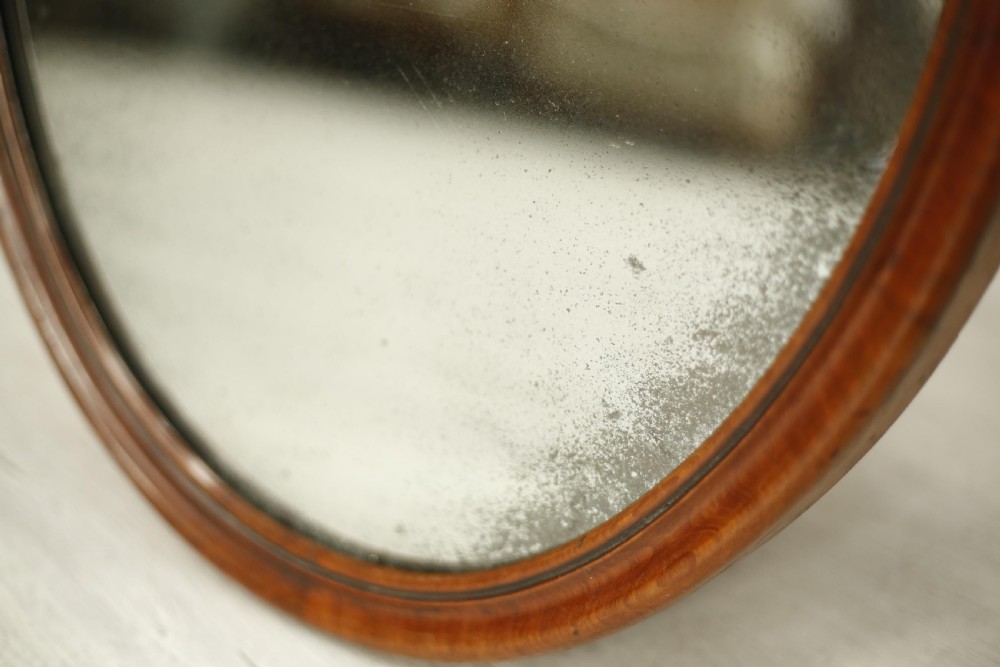 19th century Oval mahogany wall mirror View IX