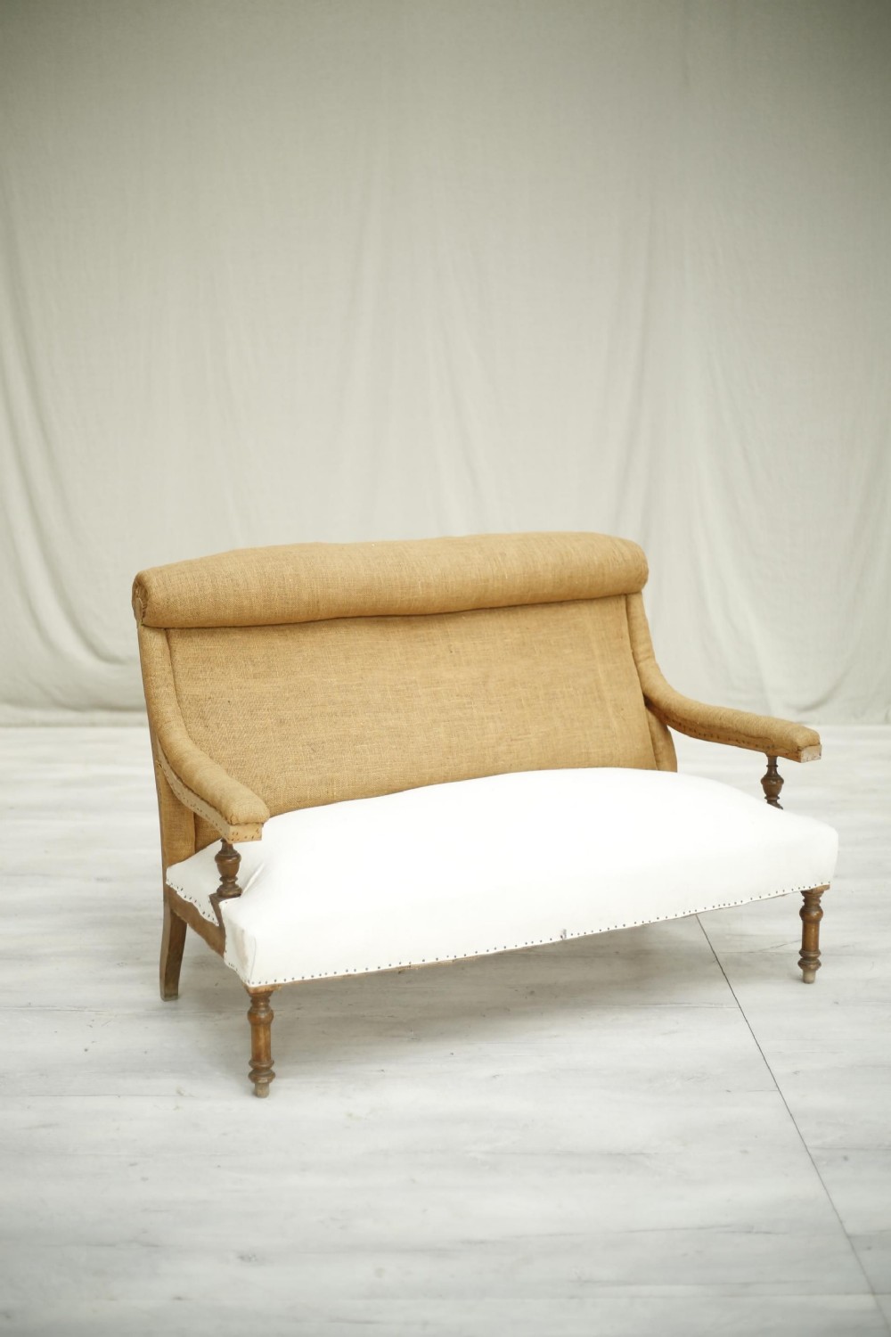 19th century French roll top open armed sofa
