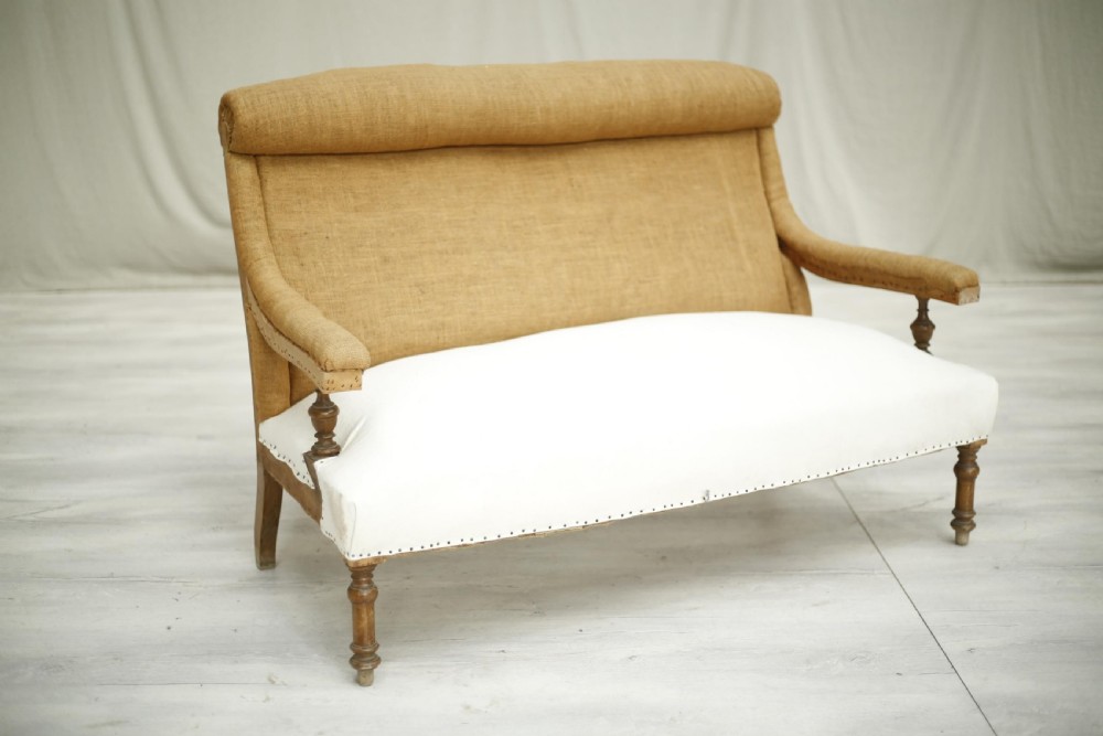 19th century French roll top open armed sofa View II