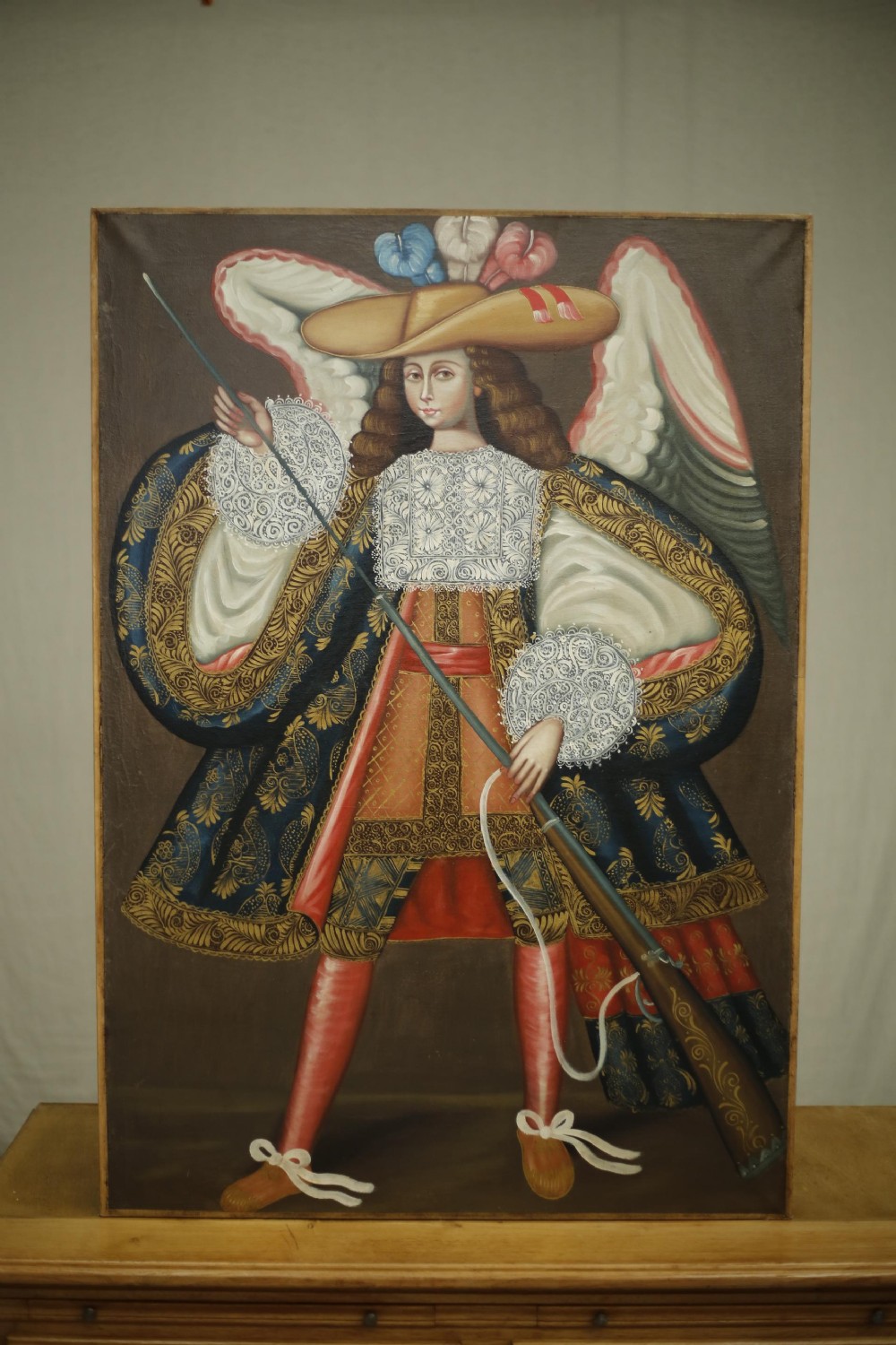 20th century oil painting of an Angel with a rifle