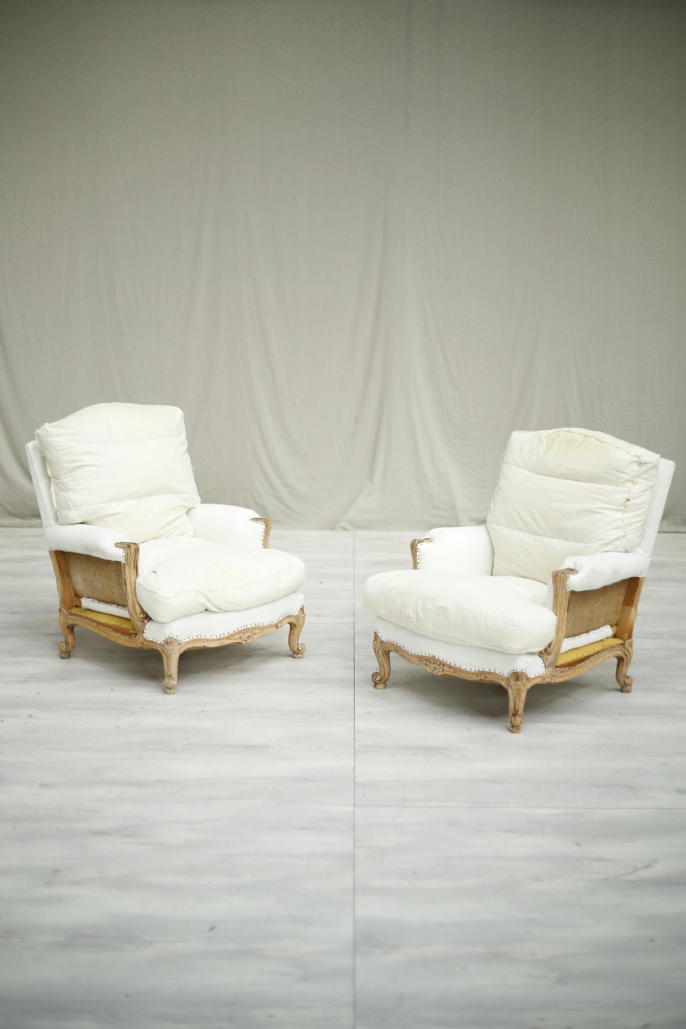 Pair of 20th century pale framed French armchairs