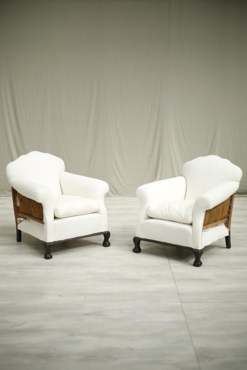 Pair of c.1900 country house armchairs - claw feet