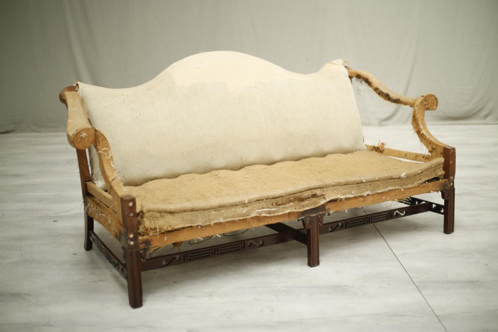 American c.1920's camel backed sofa with fret work stretcher View II