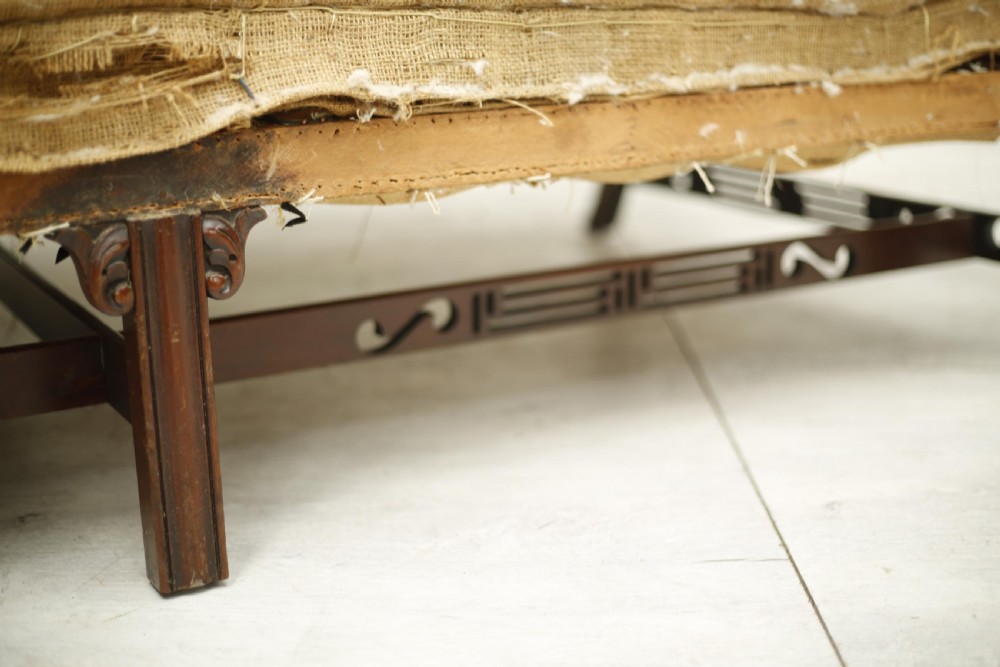 American c.1920's camel backed sofa with fret work stretcher View V