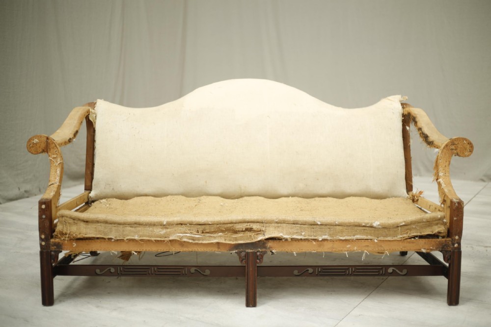American c.1920's camel backed sofa with fret work stretcher View VI