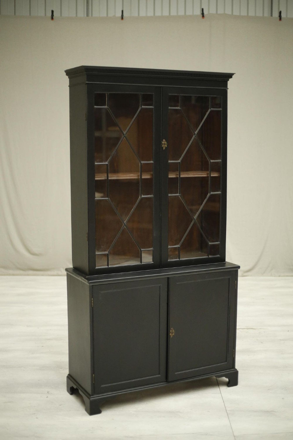 Victorian ebonised glazed library cabinet