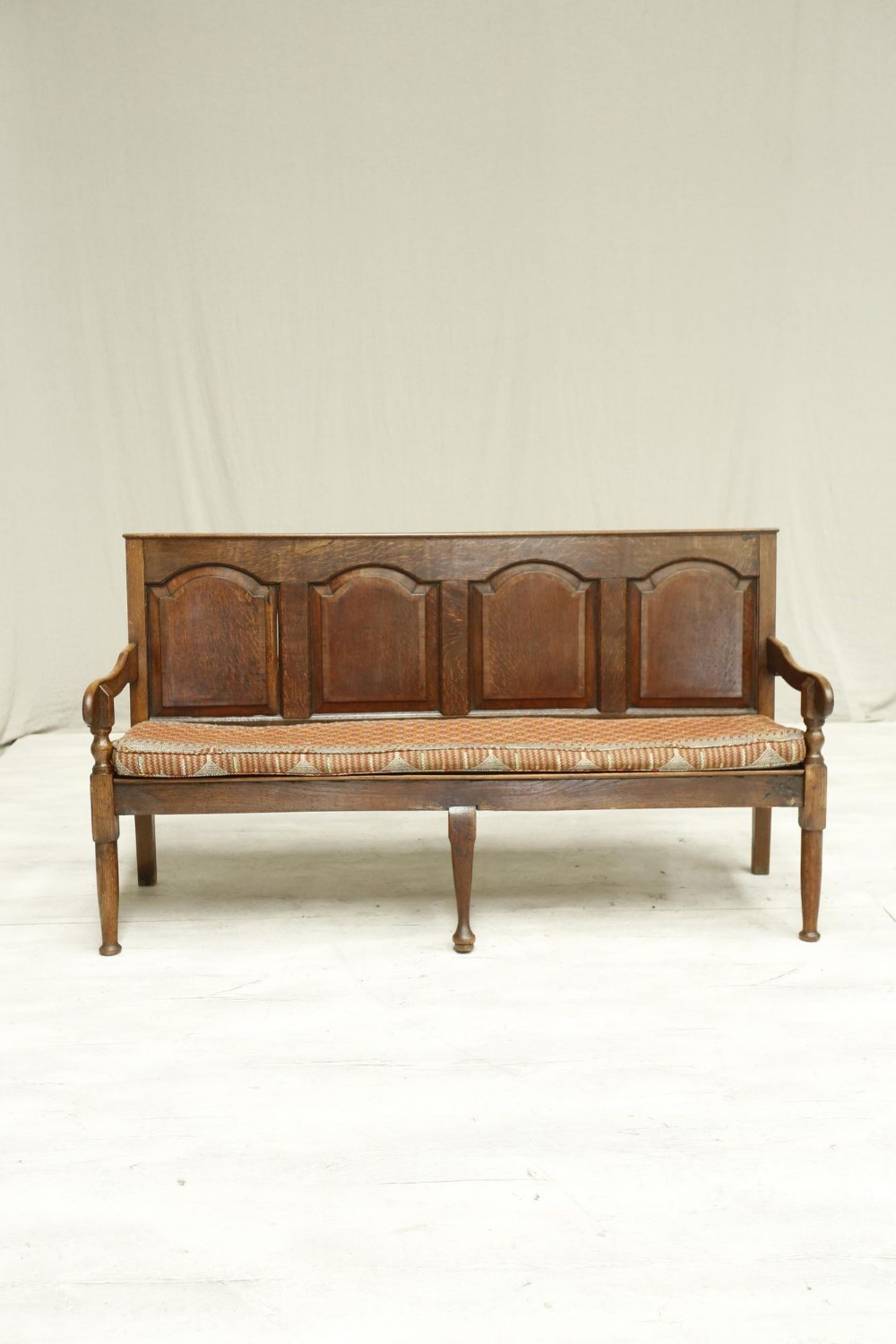 18th century oak settle with kilim seat cushion