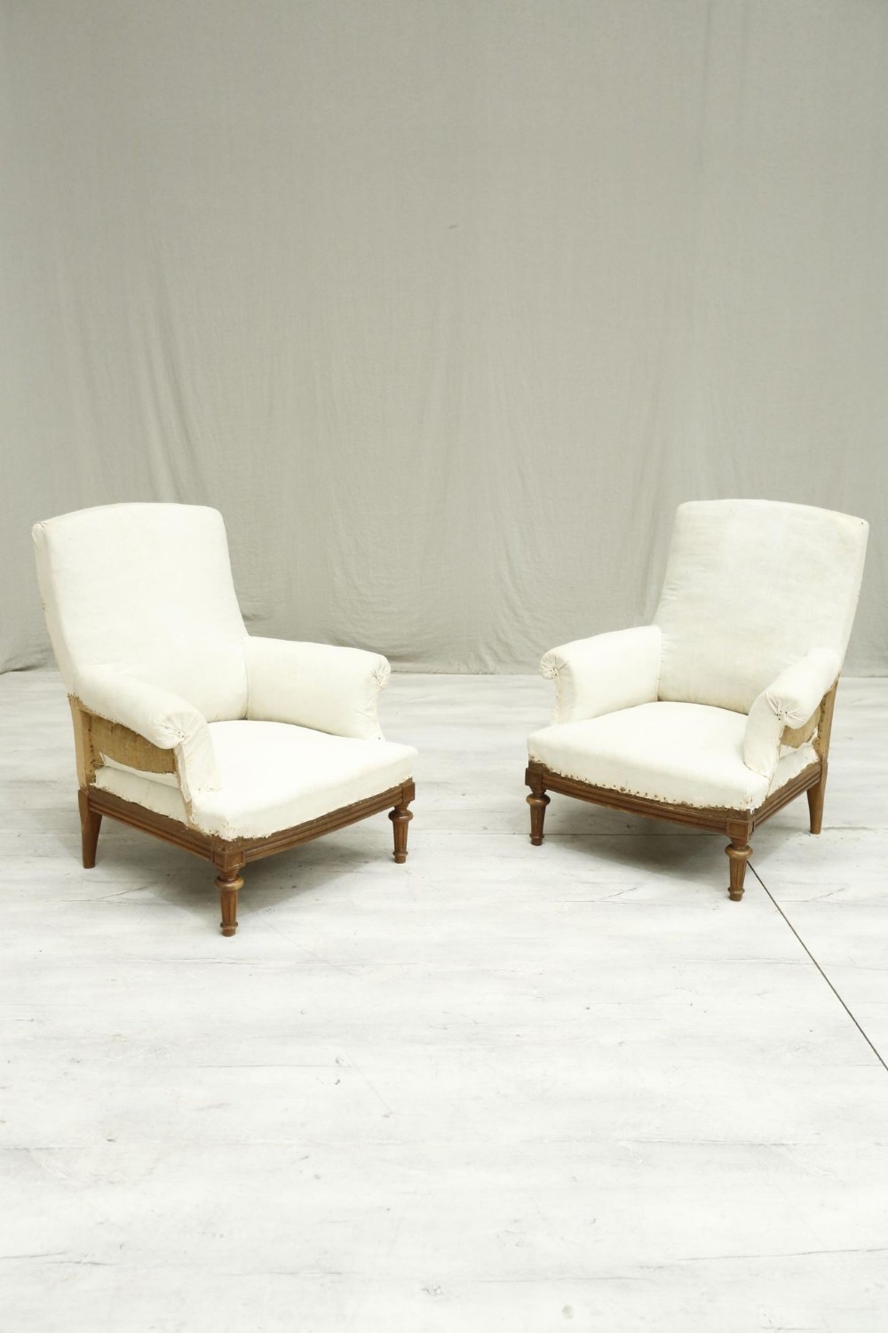 Pair of French armchairs with carved frame