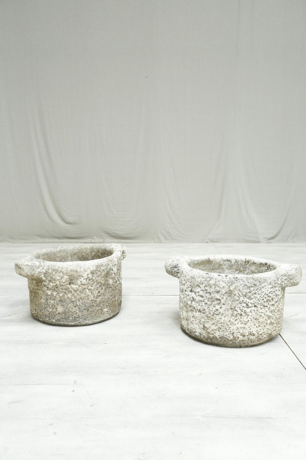 Pair of antique hewn stone mortars