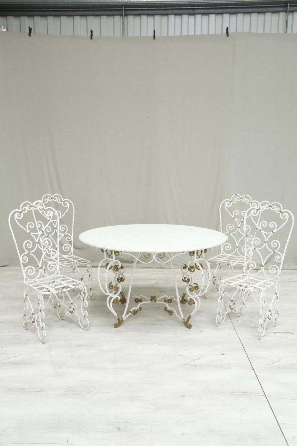 White marble circular garden table and chairs