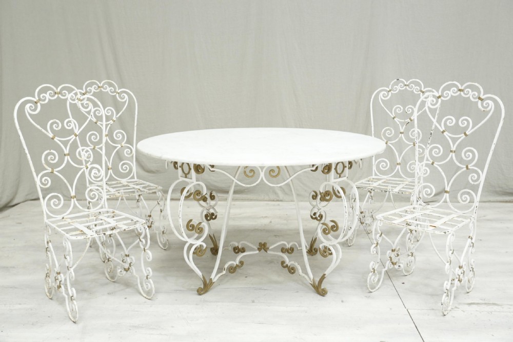White marble circular garden table and chairs View II