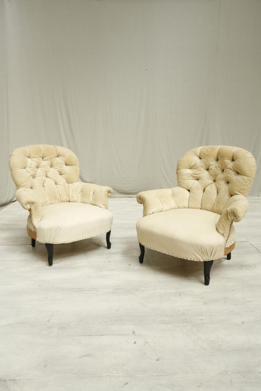 Pair of Napoleon III balloon backed armchairs