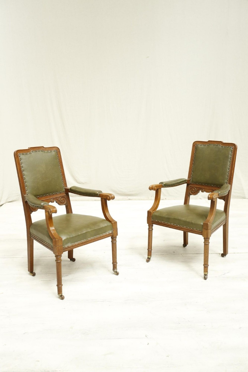 Pair of late Victorian oak desk chairs