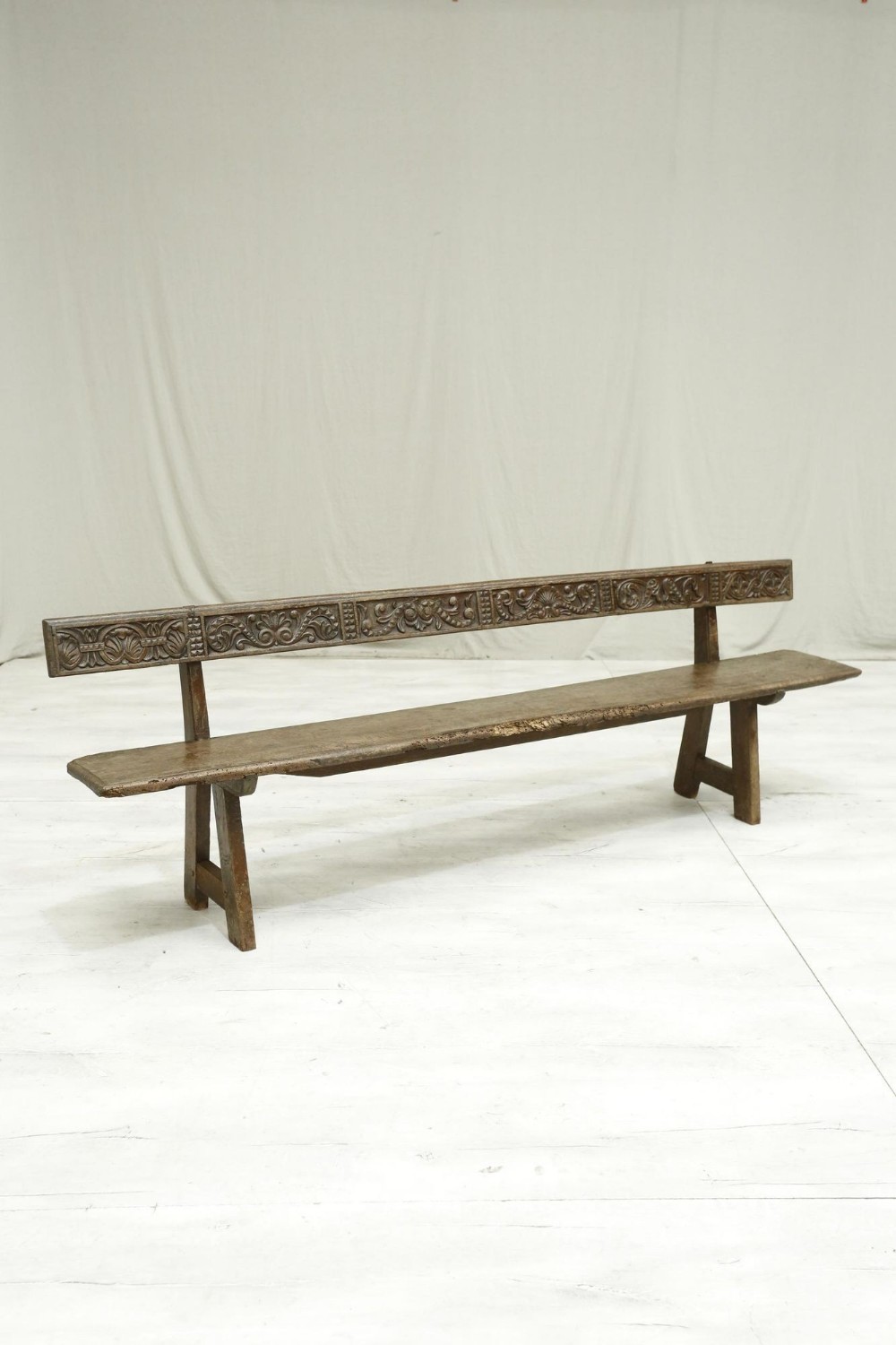 19th century Spanish walnut hall bench with carved back
