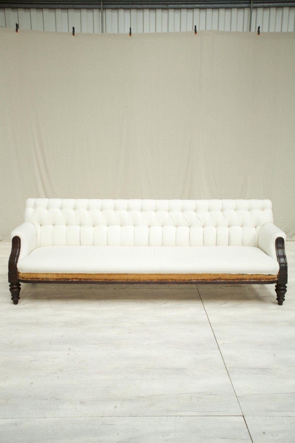 2.6m Victorian buttoned back sofa with mahogany frame