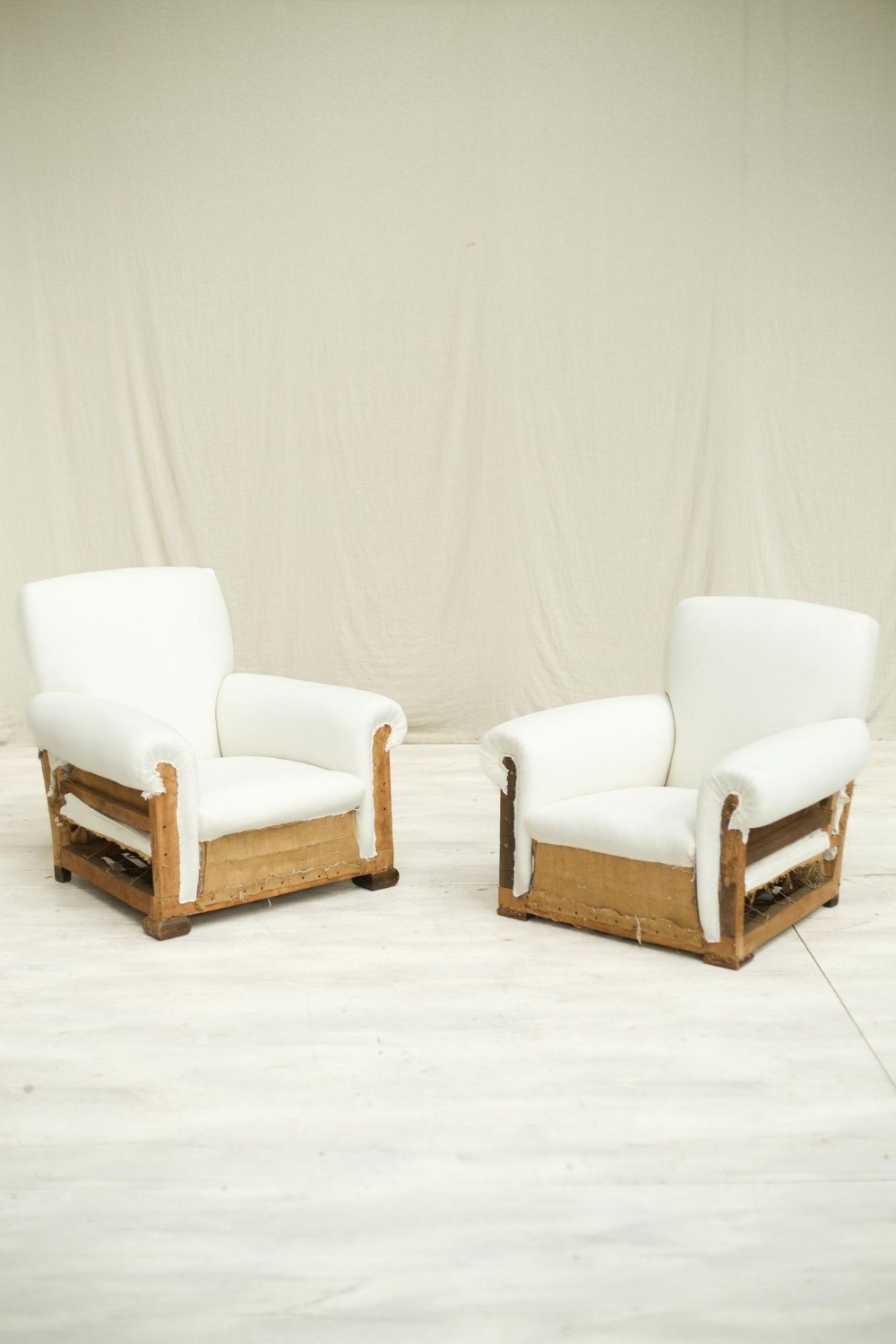 Pair of 20th century His and Hers club chairs