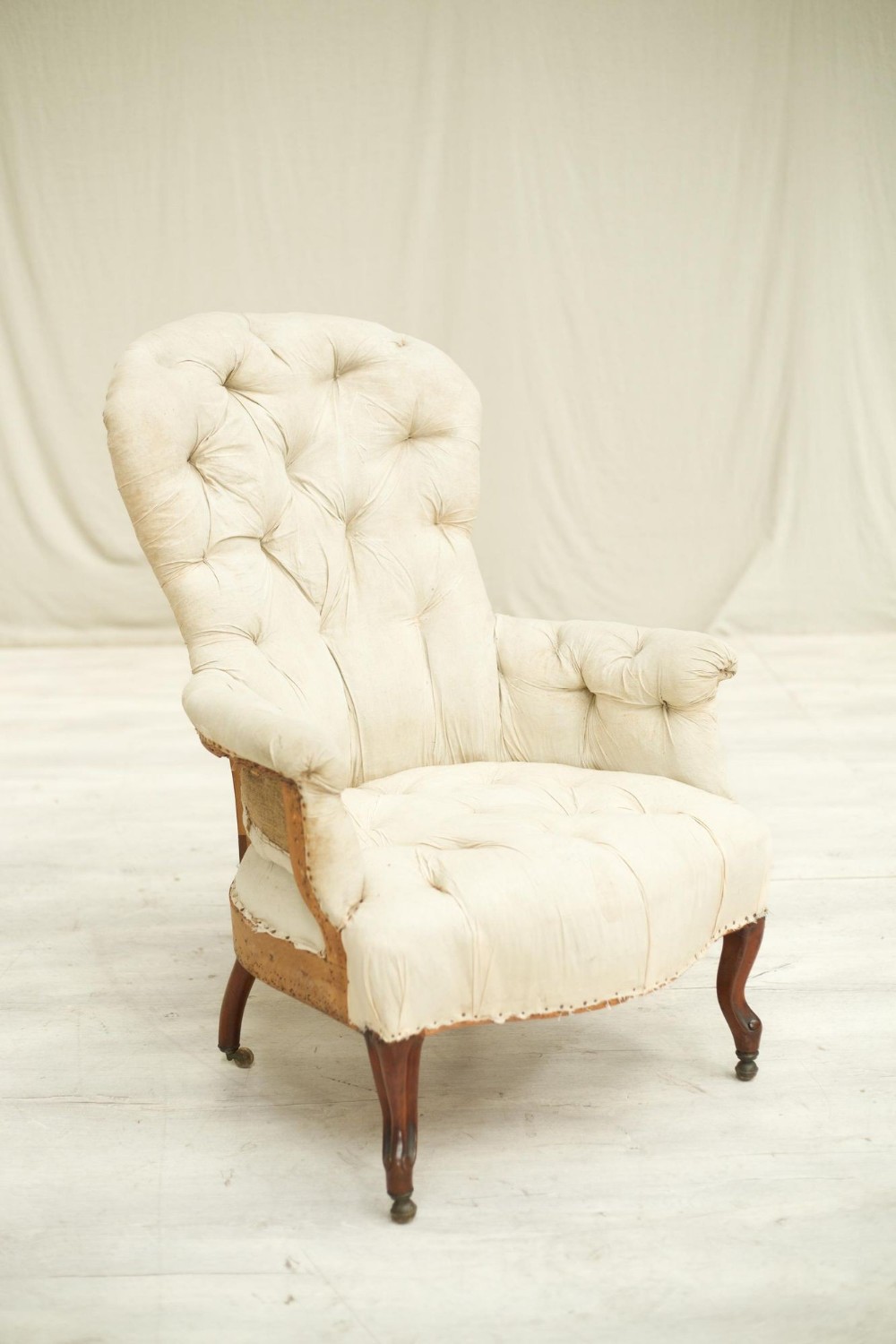 19th century French Buttoned balloon back armchair