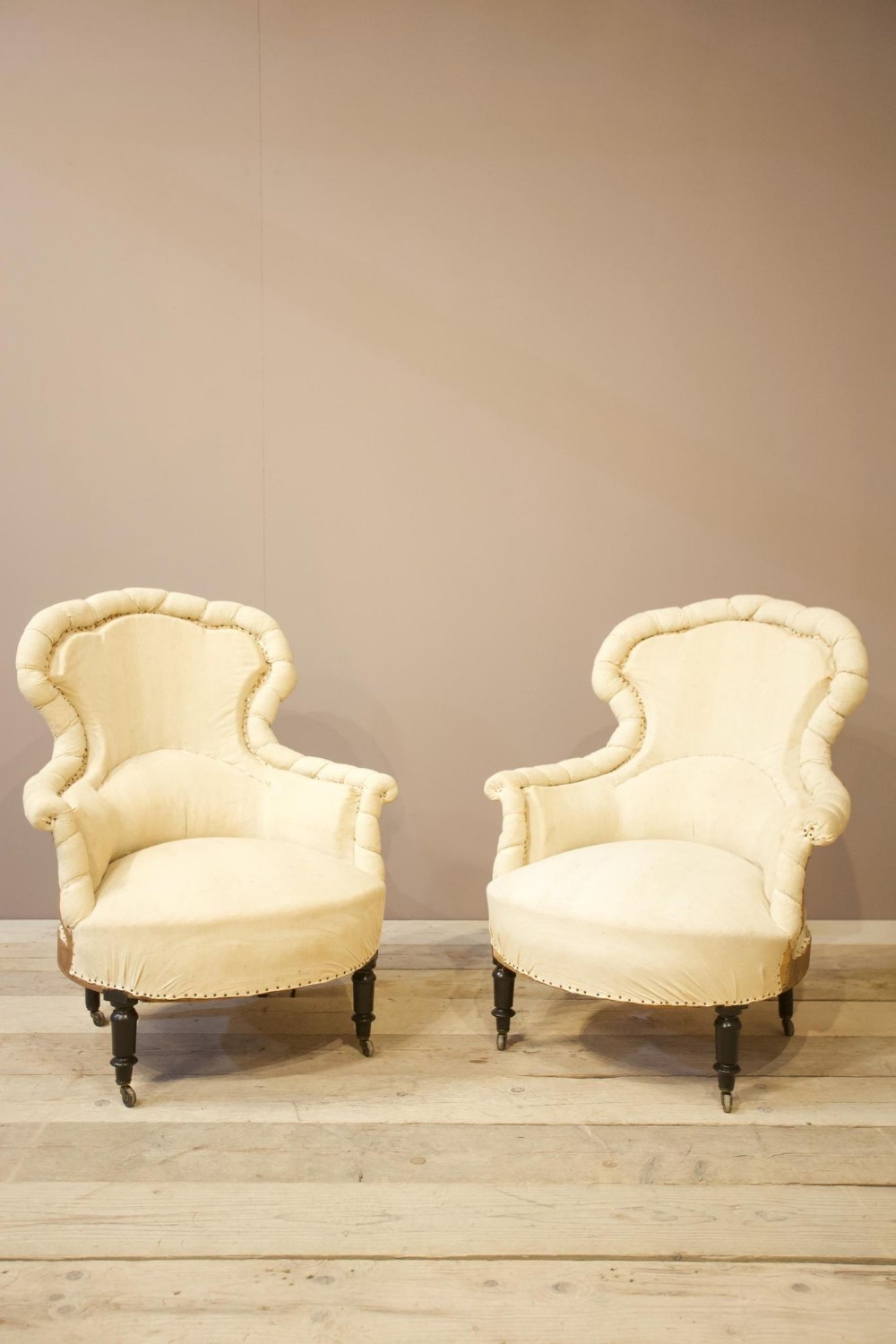 Pair of Napoleon III Scalloped pie crust armchairs