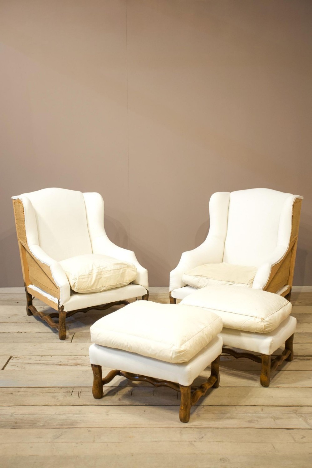 20th century Os De Mouton armchairs with stools