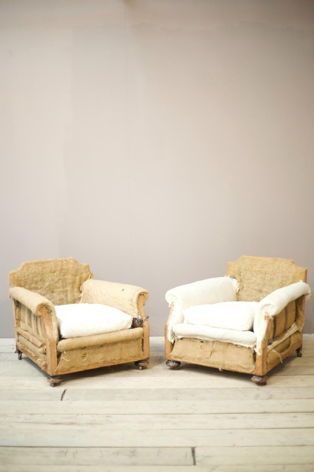 Pair of c.1900 English deep seated armchairs