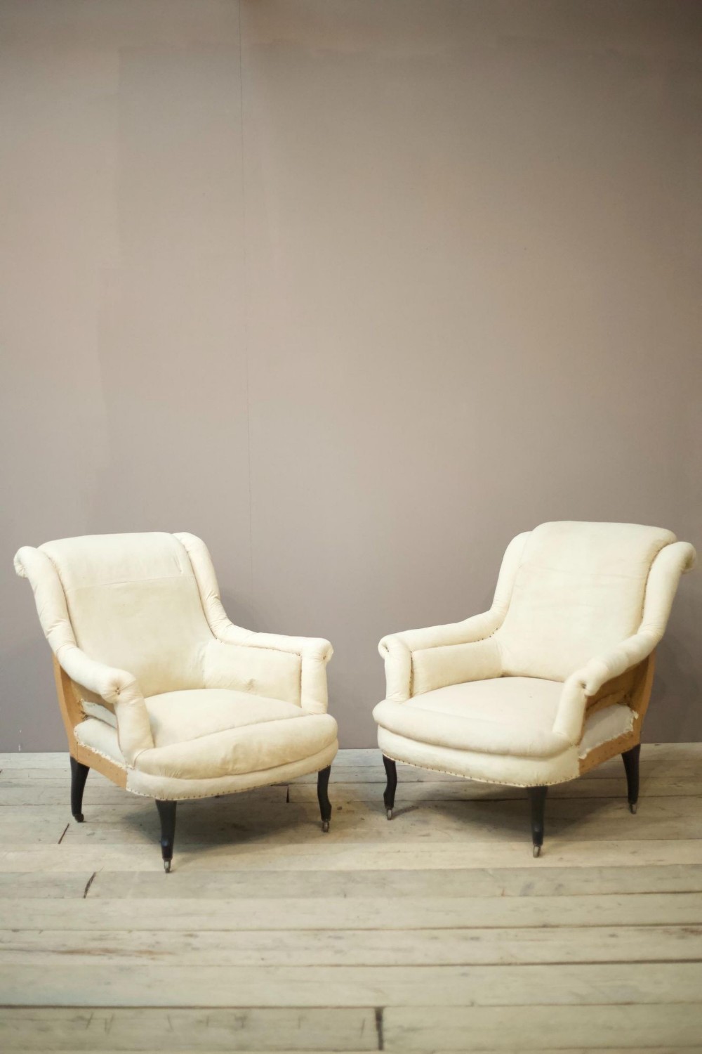 Pair of Napoleon III scroll back pie crust armchairs