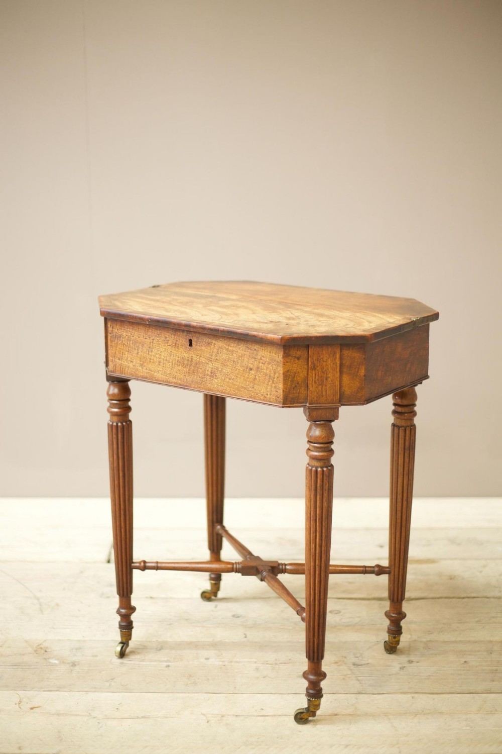 Georgian lift top mahogany table with reeded legs