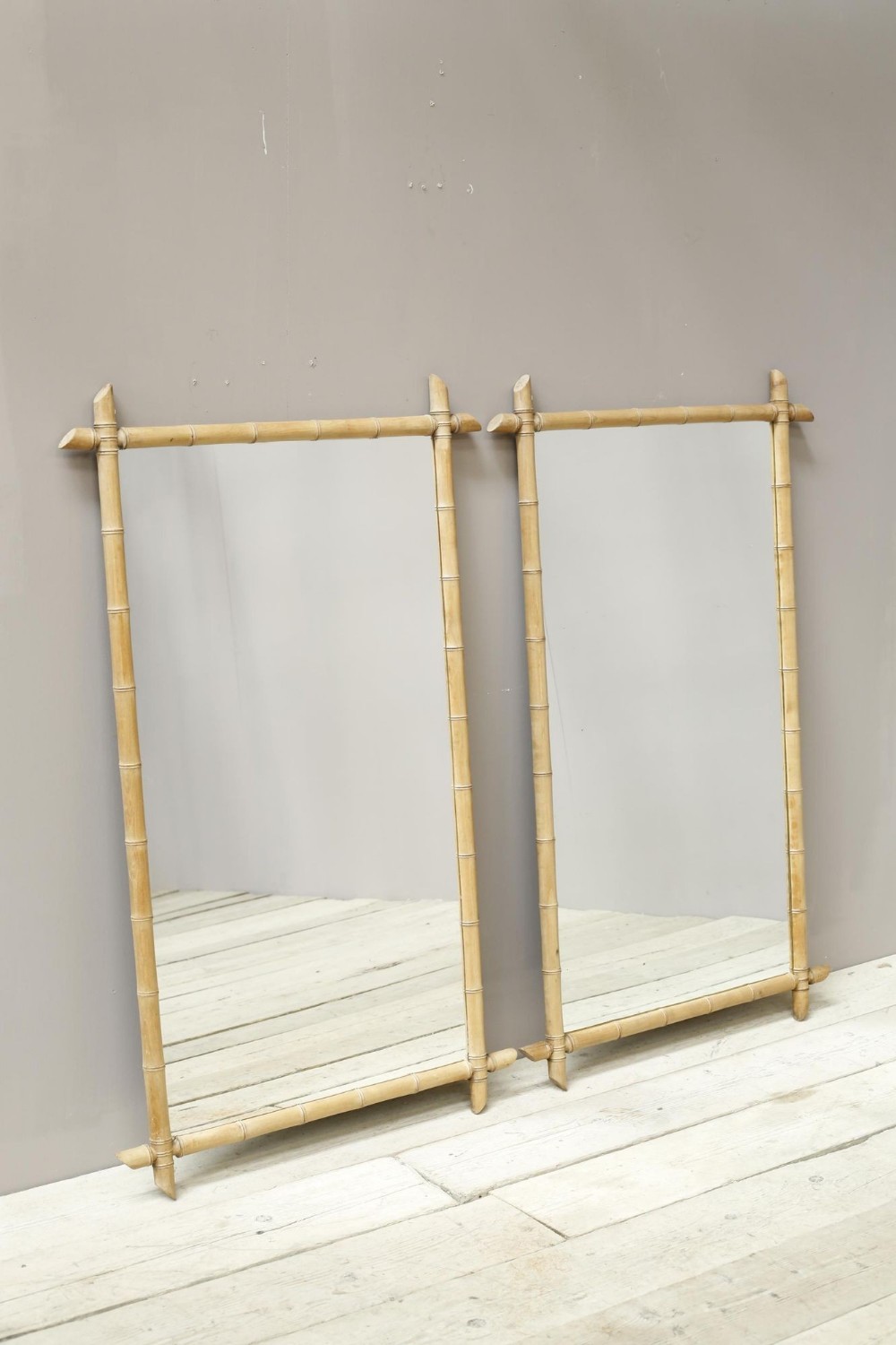 Pair of large 20th century faux bamboo mirrors