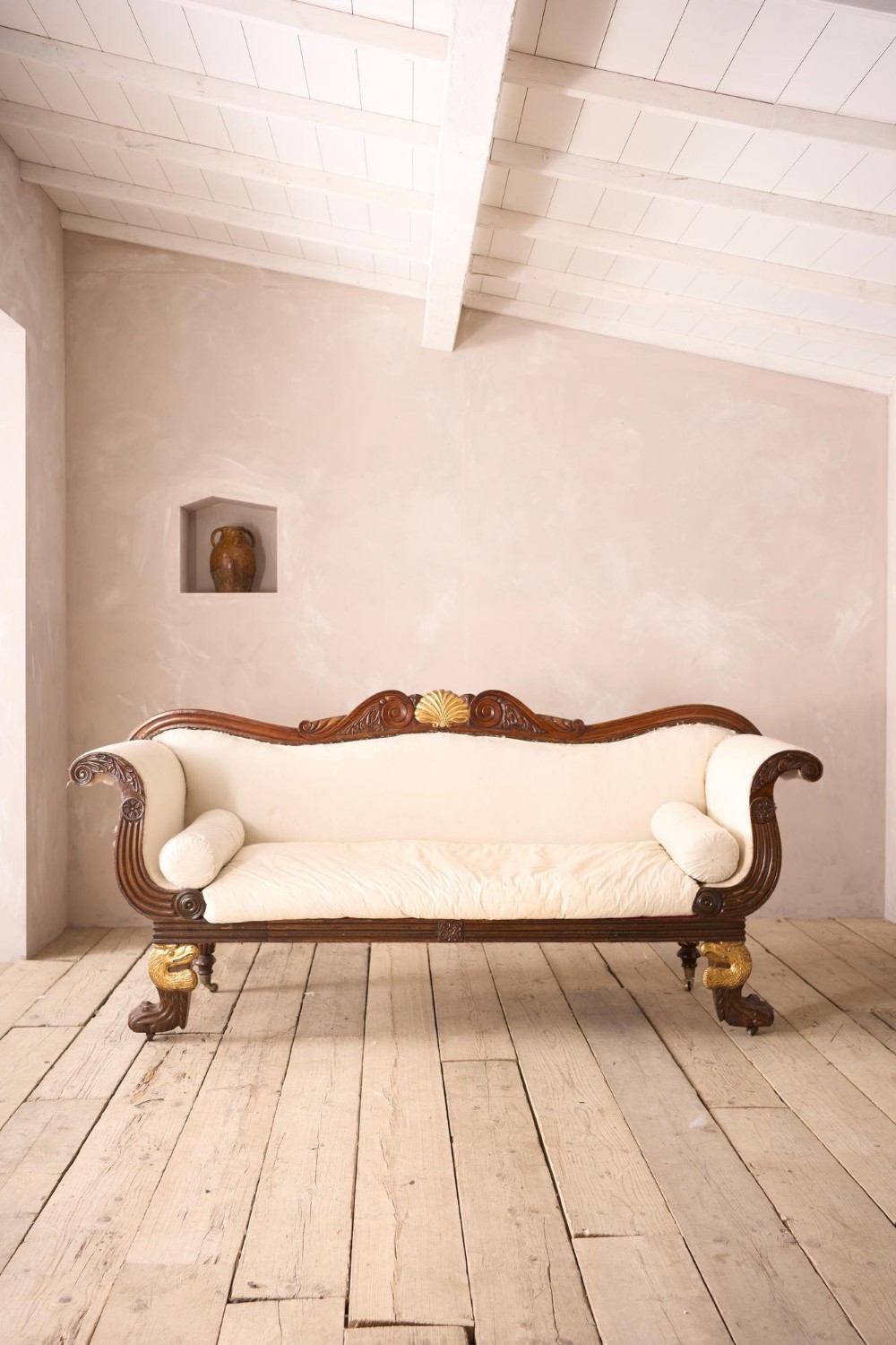 Antique Regency Mahogany framed sofa with Dodo head detail