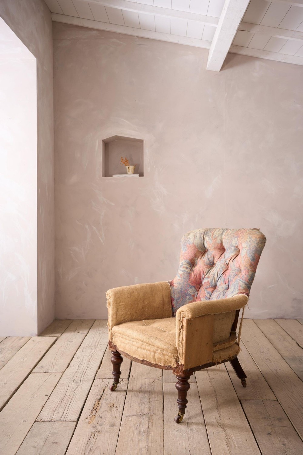 Early Victorian buttoned back country house armchair

