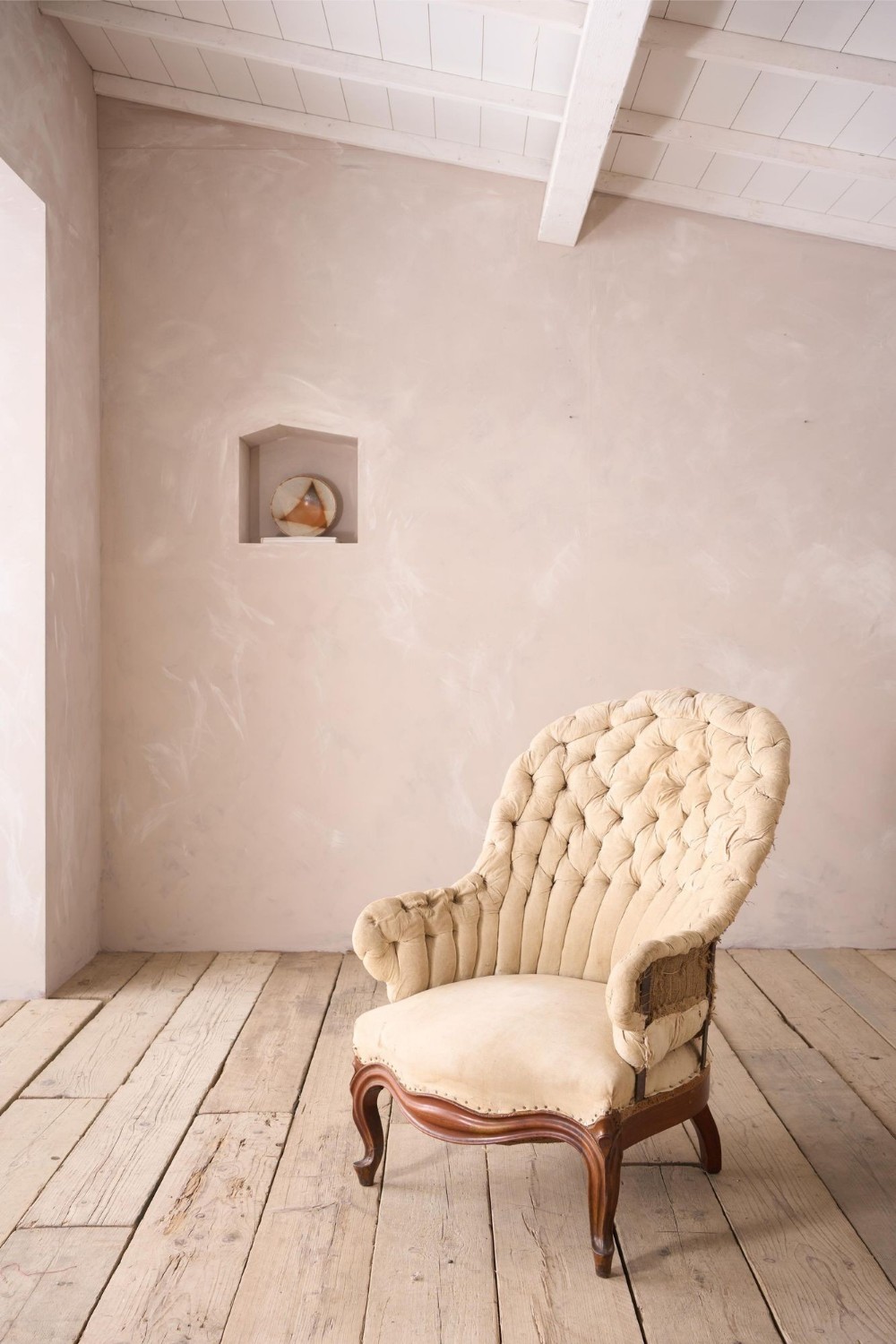 19th century French buttoned iron back armchair