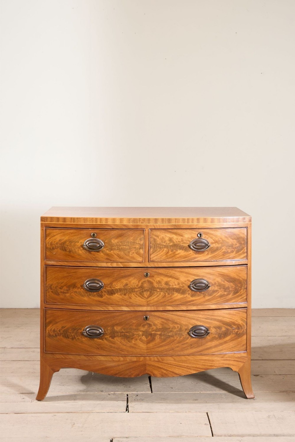 Early 20th century Bow fronted mahogany chest of drawers
