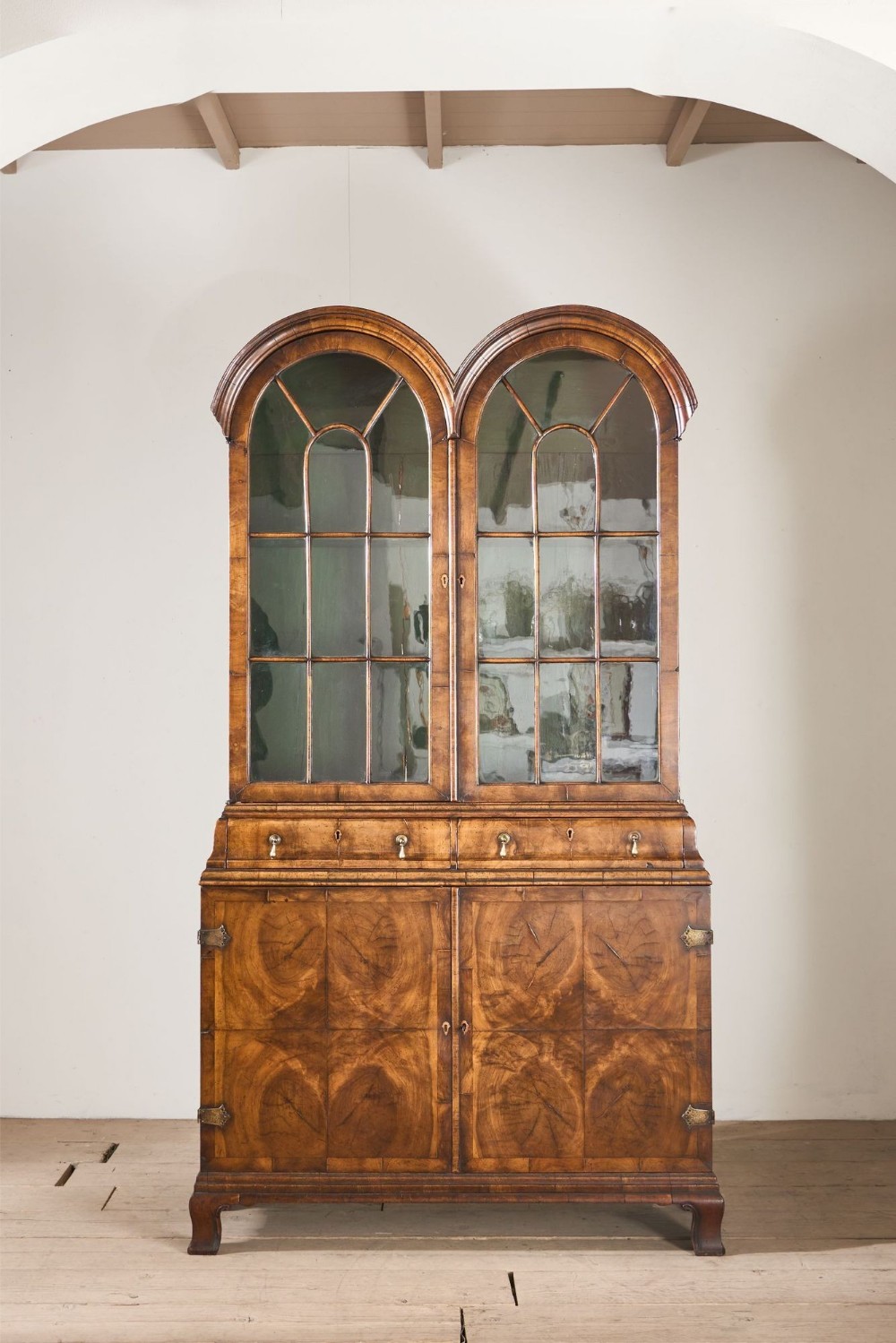 19th century George I style double arched walnut cabinet
