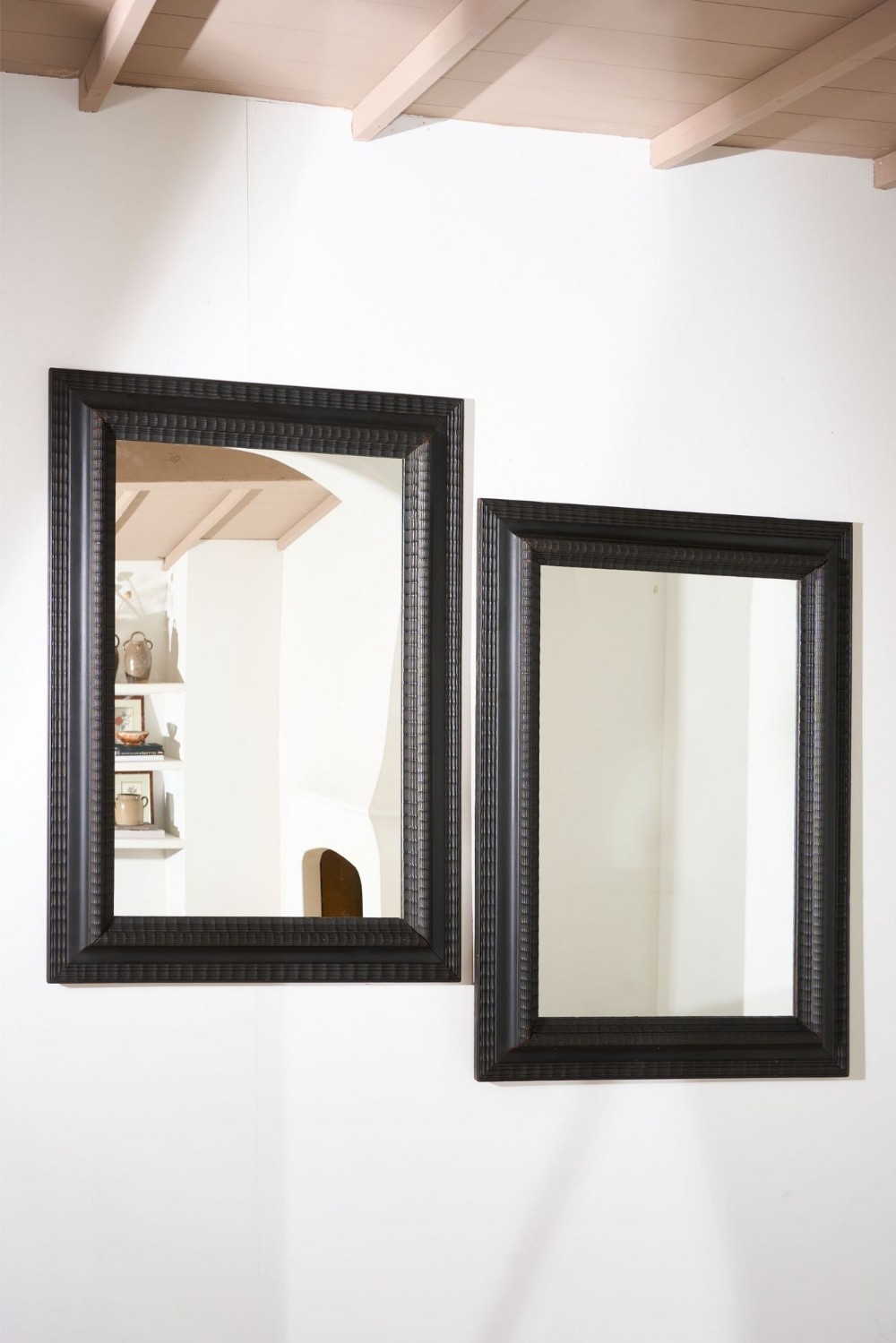 Pair of large 19th Century Ebonised Italian wall mirrors