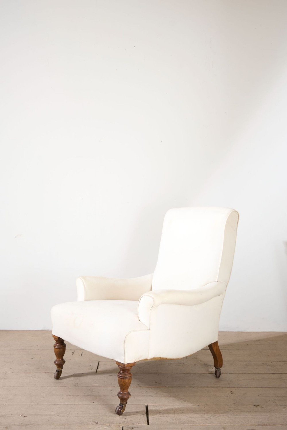 19th century large shapely sided country house armchair